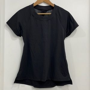 Never worn tonic black large tennis tshirt with back cut out